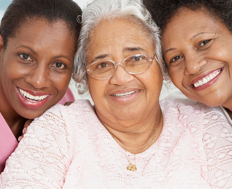 Senior-African-American-woman-with-nurse-and-daughter